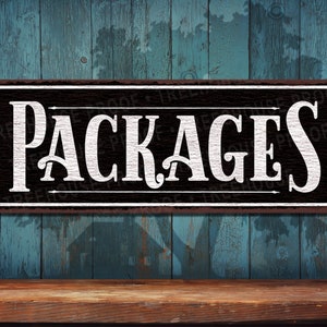 May include: A black metal sign with white lettering that reads "PACKAGES". The sign has a distressed, vintage look and is mounted on a wooden surface.