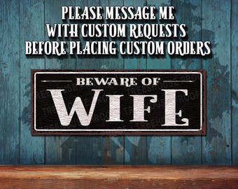 Beware Of Wife Metal Sign: • Black & White Rustic Looking Aluminum Sign - Color Imprint on Rustproof Aluminum • Made in the USA - THC2935-A