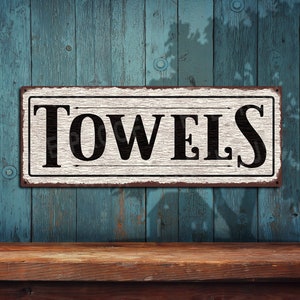 Towels Sign • Distressed White Rusted Looking Aluminum Sign - Color Imprint On Rustproof Aluminum - THC2566-A