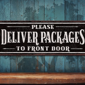 May include: A rustic brown metal sign with white text that reads "Please Deliver Packages To Front Door".