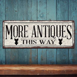 More Antiques This Way With Down Pointing Arrows • Rustic Looking Aluminum Sign - Color Imprint On Rustproof Aluminum - USA Made - THC2686-A