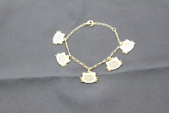 Hello Kitty 18 Karat Gold Bracelet With Five Charms Momoberry