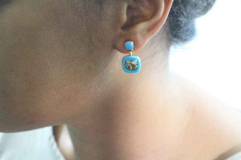 Momoberry Sanrio Hello Kitty Gold Pierced Earrings with Black Gemstone