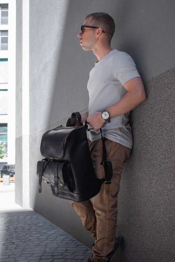 bespoke travel backpack Justus while a secure and hidden cell phone pocket at the back adds an extra layer of security Personalized Leather Backpack, Custom Travel