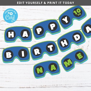 May include: A blue and green birthday banner with the words "Happy Birthday" and "10th" in white letters. The banner is shaped like a pair of goggles.