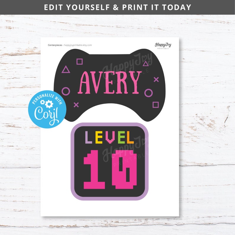 May include: Printable party decorations for a video game themed party. The decorations feature a black and white video game controller with the name Avery and the text "Level 10" in pink and black pixelated font.