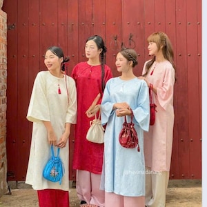 Red Cach Tan Ao Dai Dang Suong Tay Loe Vietnamese Long Dress Flared Sleeves with White Pants