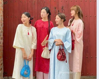 Red Ao Dai: Vietnamese Dress with Flared Sleeves & White Pants
