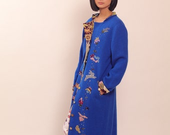 Blue wool coat with floral embroidery and natural silk lining