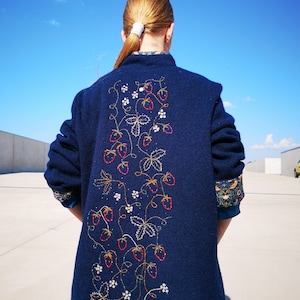 Knitted jacket with embroidered strawberries and silk lining