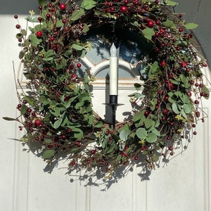 over the door metal hook to hold your wreath and a candle