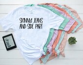 Skinny jeans and side part tshirt