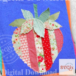 May include: A blue t-shirt featuring a patchwork strawberry design. The strawberry is crafted from red, pink, and green patterned fabrics. The words "Digital Download" are printed across the shirt.