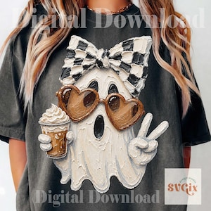 May include: A charcoal gray t-shirt featuring a textured, impasto-style graphic of a white ghost wearing a black and white checkered bow, brown heart-shaped sunglasses, and holding a coffee cup while making a peace sign with one hand.