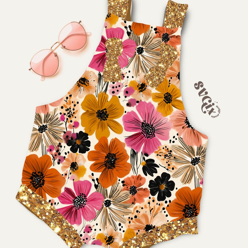 May include: A floral-patterned romper with a cream background, featuring orange, pink, and yellow flowers. The romper has gold glitter accents on the straps and edges. Pink sunglasses rest on the side. The design includes the text "svgix".