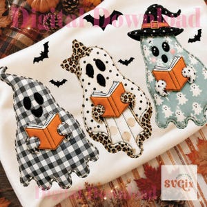 May include: Three ghost-shaped fabric ornaments featuring black and white buffalo plaid, white with black polka dots and leopard print, and light blue with a white ghost pattern. Each ghost holds an orange book, with one wearing a witch hat.