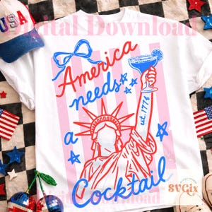 May include: White t-shirt with a patriotic design featuring the text "America needs a Cocktail" in red and blue. The design includes the Statue of Liberty, stars, and a cocktail glass. A USA hat is visible.