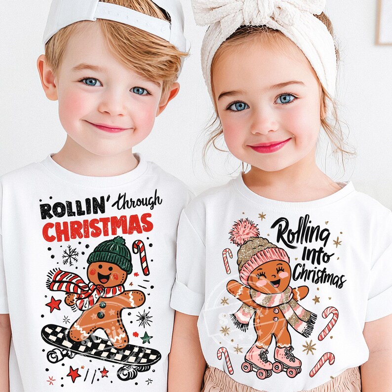 May include: Two children wearing white t-shirts with Christmas graphics. One shirt says "ROLLIN' through CHRISTMAS" with a gingerbread man on a skateboard. The other says "Rolling into Christmas" with a gingerbread man on roller skates.