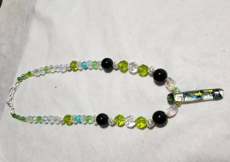clear Light green and black glass necklace
