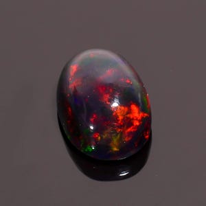 Welo Fire Ethiopian Opal Cabochon: Oval Gemstone, 3.5 ct