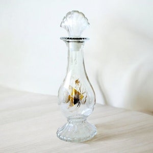 Garrafa de vidro transparente Avon vintage colecionável dos anos 1970, decantador dourado com tampa, contas de sal de banho, decoração de praia para penteadeira *LEIA COMPRADORES DOS EUA*