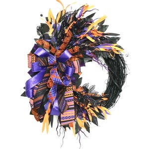 Halloween Grapevine Wreath: Purple, Orange & Black Glitter Ribbon Decor