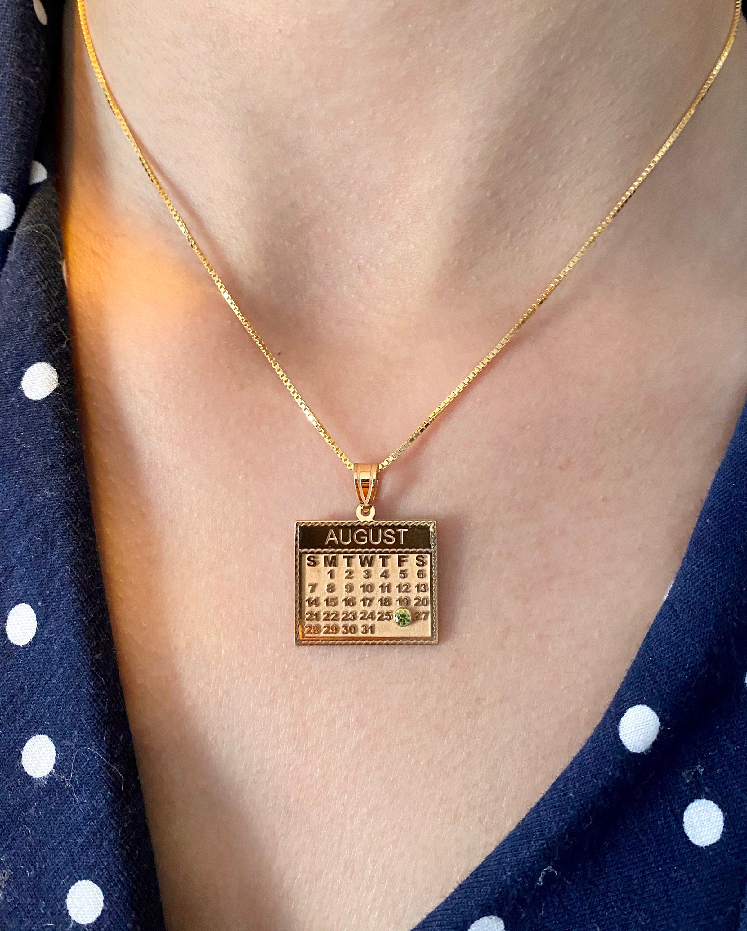 the calendar necklace in yellow or white gold – dalla nonna llc