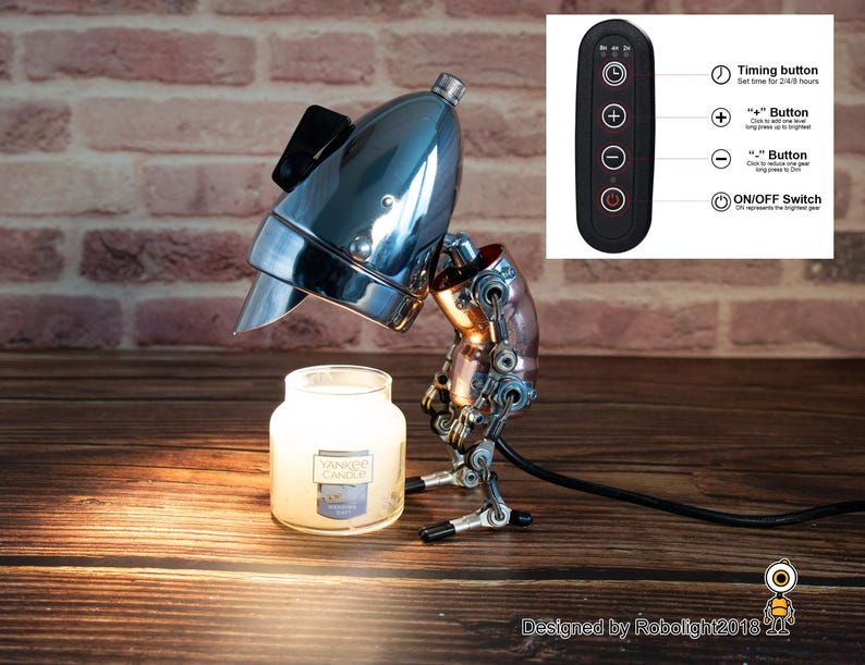 May include: A steampunk-style table lamp with a chrome lampshade and copper accents. The lamp is illuminating a candle jar. The lamp has a remote control with a timer, plus and minus buttons, and an on/off switch. The remote control is labeled with the functions of each button. The lamp is designed by Robolight2018.