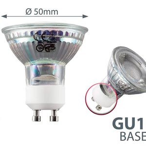 May include: A clear glass GU10 light bulb with a white base. The bulb is 50mm in diameter and 53mm in height. The base is labeled "GU10 BASE".