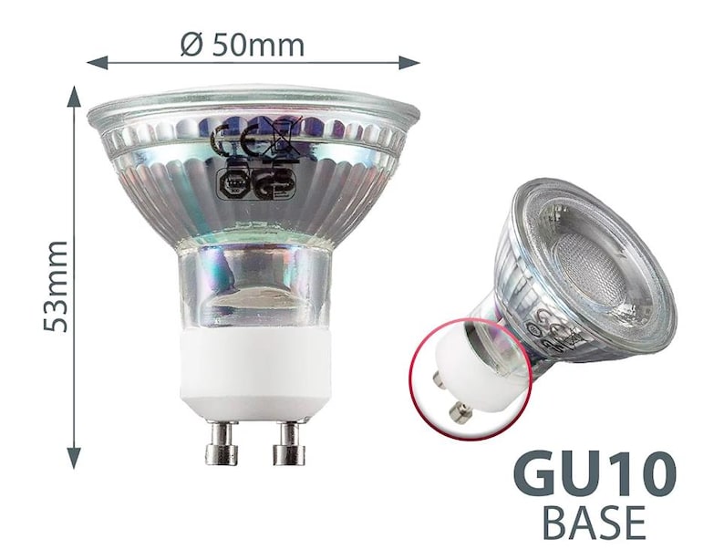 May include: A clear glass GU10 light bulb with a white base. The bulb is 50mm in diameter and 53mm in height. The base is labeled "GU10 BASE".