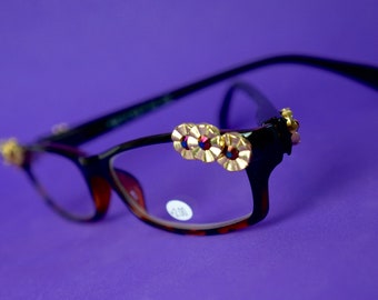 Embellished +2.0 readers in four styles