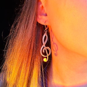 Iridescent rainbow treble clef music note acrylic earrings