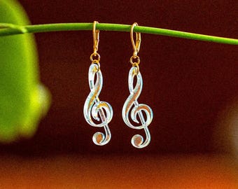 Iridescent rainbow treble clef music note acrylic earrings