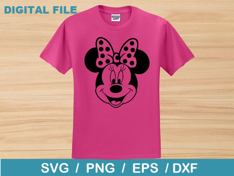 Op de afbeelding: Een magenta t-shirt met een zwarte afbeelding van Minnie Mouse's gezicht, inclusief haar stippen strik. De woorden "DIGITAL FILE" staan bovenaan en "SVG / PNG / EPS / DXF" onderaan.