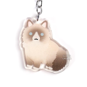 Blue Point Ragdoll Cat porte-clés en acrylique pour animaux de compagnie | Charm scintillant art animalier Chibi dessin animé | Joli cadeau Kawaii pour les amoureux des chatons aux cheveux longs