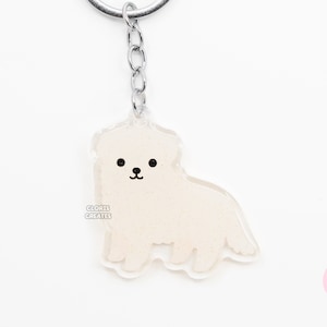 Porte-clés acrylique chien de berger des Grandes Pyrénées Kuvasz Maremma | Art Kawaii de dessin animé à paillettes pour chiots | Joli cadeau commémoratif de perte d'animal de compagnie Chibi