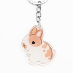 Broken Red Netherland Dwarf Rabbit Acrylic Pet Keychain | Cartoon Kawaii Art Double-Sided Bunny Glitter Charm | Chibi Cute Animal Lover Gift
