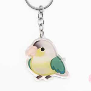 Llavero acrílico de conure turquesa y canela, con purpurina, estilo kawaii de dibujos animados, regalo para amantes de las mascotas exóticas.