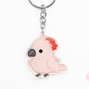 Llavero acrílico de cacatúa de las Molucas con forma de pájaro y loro. Dije de purpurina de doble cara con diseño de dibujos animados kawaii. Bonito regalo para amantes de las mascotas exóticas.