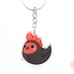 Llavero acrílico de pollo negro con diseño de ave exótica, diseño kawaii de dibujos animados, con purpurina, ideal como recuerdo para amantes de los animales de granja.