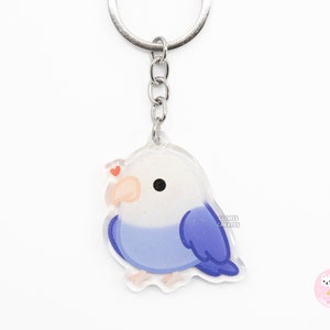 Llavero acrílico de agapornis de cabeza blanca violeta, diseño de loro, con purpurina de dibujos animados kawaii, regalo para amantes de las mascotas exóticas chibi.