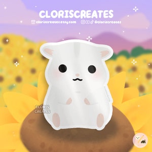 May include: A white hamster with black eyes and a small mustache sits on a sunflower. The background is a field of sunflowers with a purple and pink sky.
