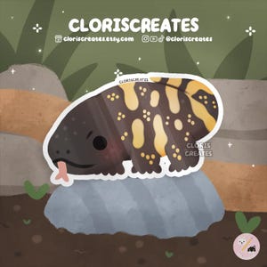 以下が含まれることがあります： 暗い茶色の体と黄色の斑点を持つ漫画のサンショウウオのステッカー。 サンショウウオはピンクの舌を持っており、灰色の岩の上に座っています。 ステッカーには「CLORISCREATES」というテキストとウェブサイトのアドレスが含まれています。