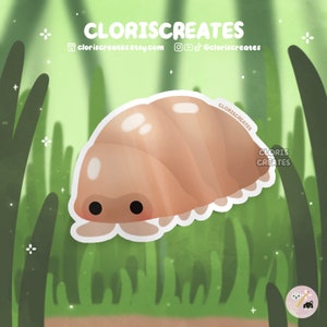 May include: A sticker featuring a cartoon pill bug in shades of tan and brown, with a white outline. The sticker has a cute design with a blush effect on the cheeks. The background is a green and light brown illustration of grass and foliage. The text "CLORISCREATES" is at the top.