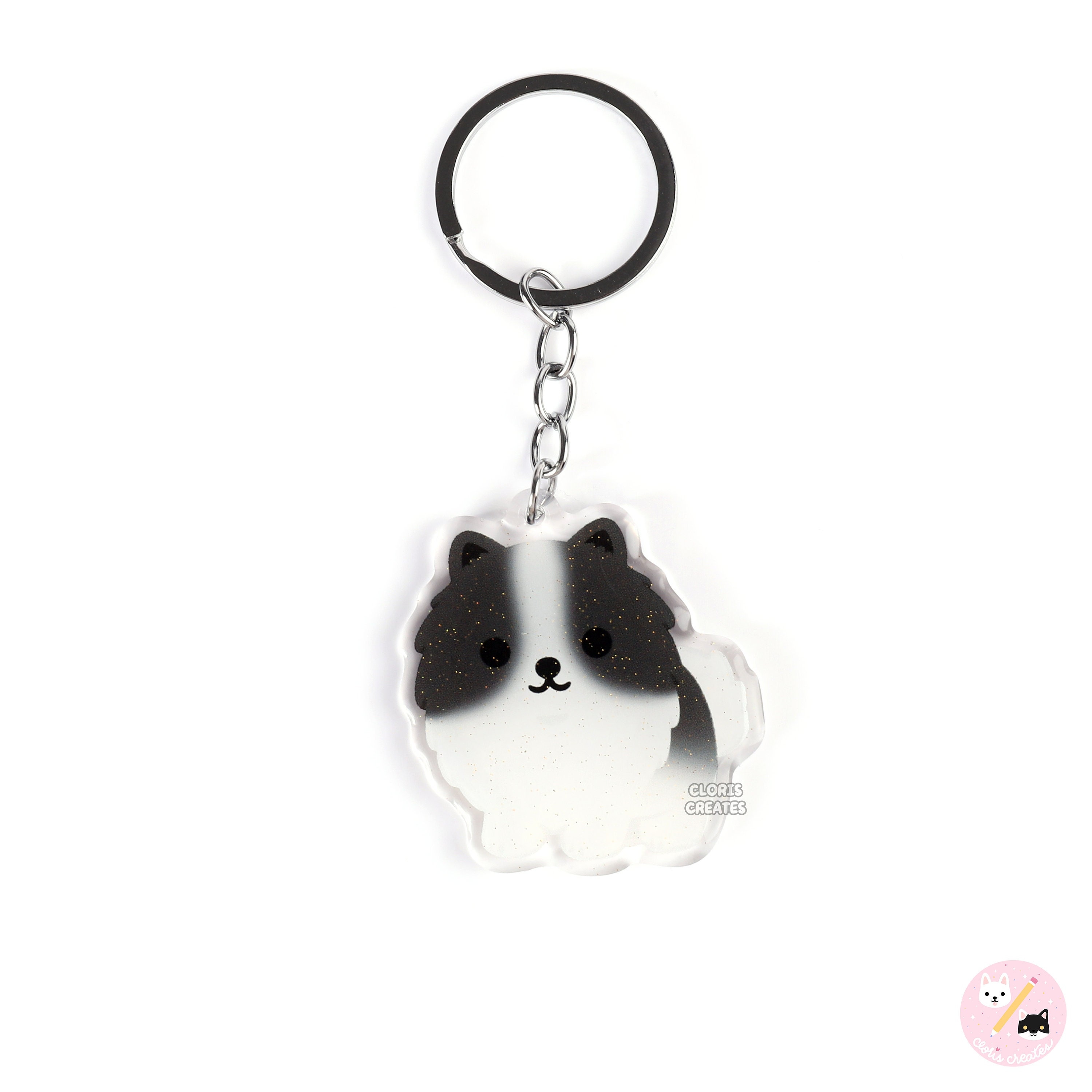 黒と白のポメラニアンアクリル犬種キーホルダー | 漫画かわいい子犬の 