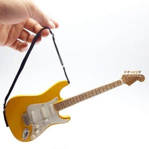 Minifiguur gitaar met gele band instrumentendisplay