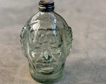 Vintage Old Monk Rum-fles: uniek glaswerk in de vorm van een gezicht