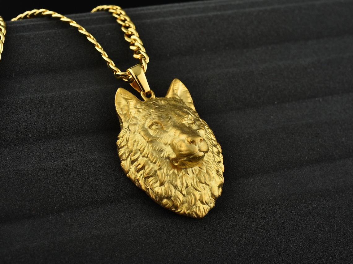 solid gold wolf pendant