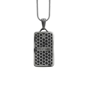 May include: Silver necklace with a rectangular pendant featuring a honeycomb pattern and the text "TEXT ME".