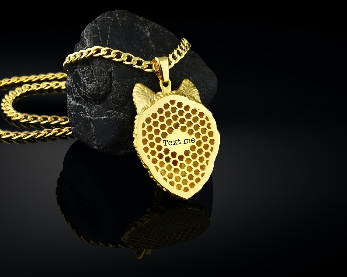 solid gold wolf pendant